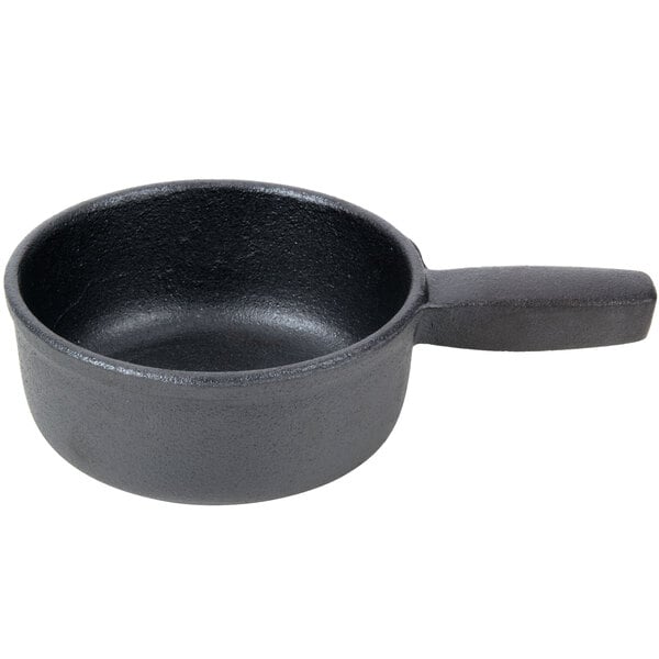 An American Metalcraft black cast iron fondue pot with a handle.
