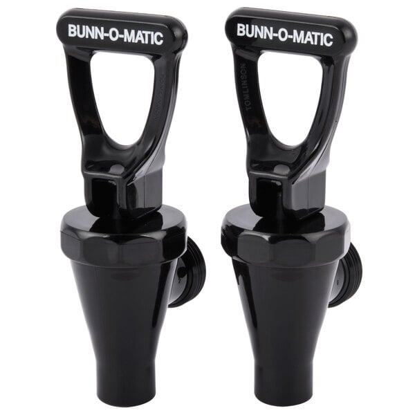 Two black plastic Bunn faucet assemblies with black handles.