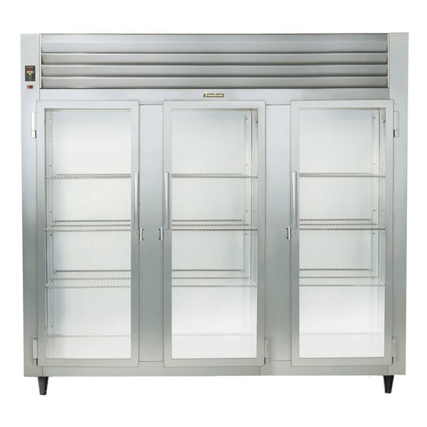 A Traulsen stainless steel reach-in refrigerator with three glass doors.
