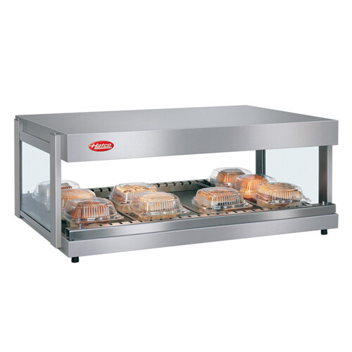 A Hatco stainless steel countertop food warmer with a tray of food on display.