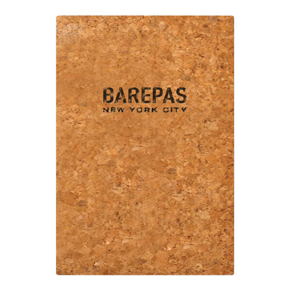 A Menu Solutions cork menu cover with black text on a brown cork surface.