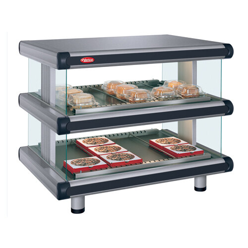 A Hatco Glo-Ray double shelf countertop food warmer with trays of food on it.