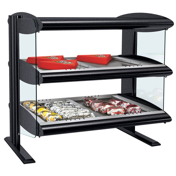 A black Hatco countertop heated zone merchandiser with food on display.