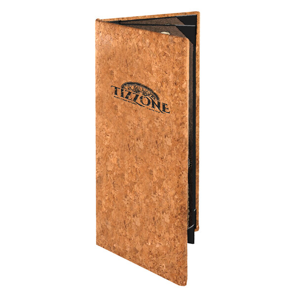A Menu Solutions cork menu cover with a black logo on a brown surface.