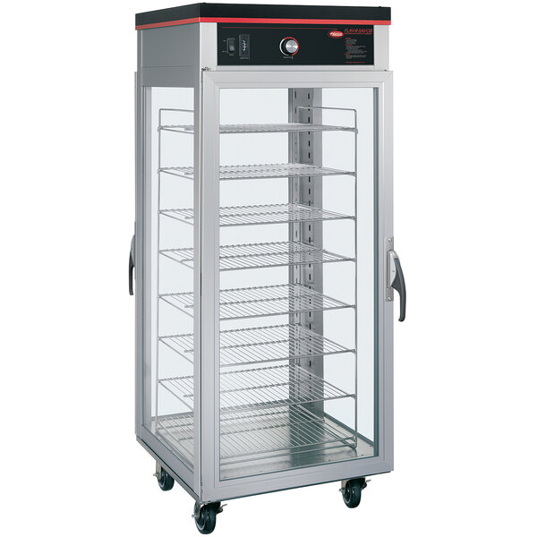 A Hatco Flav-R-Savor pass-through pizza holding cabinet with shelves and a large glass door.
