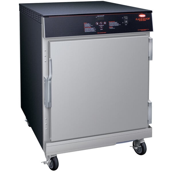 A grey and black Hatco Flav-R-Savor holding / proofing cabinet on wheels.