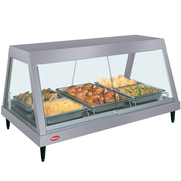A Hatco countertop hot food display warmer with a pan of food and vegetables.