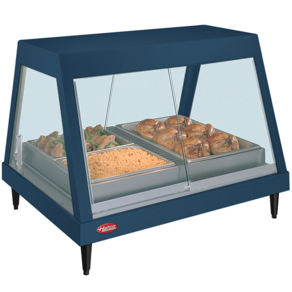 A Hatco countertop hot food display warmer with food on a tray inside.