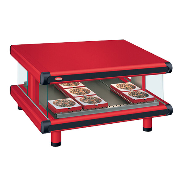 A red Hatco countertop hot food display warmer with a slanted shelf.
