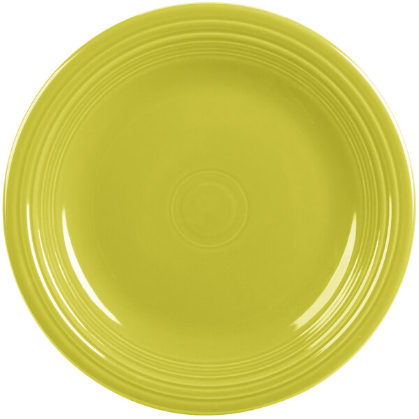 A close-up of a Fiesta® Lemongrass dinner plate with a white background.