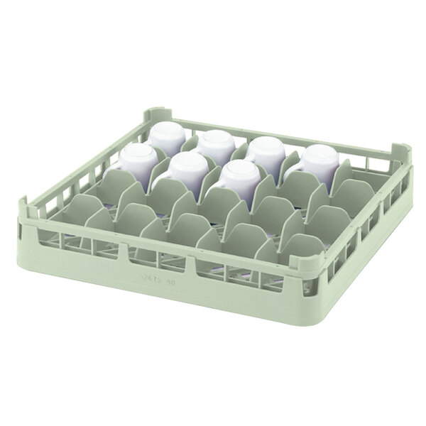 A Vollrath light green cup rack holding white cups.