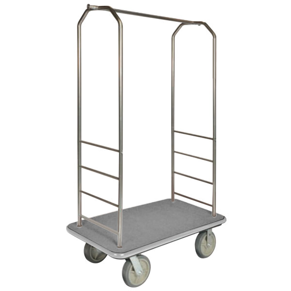 A CSL silver metal Bellman's cart with gray carpet and metal bars.