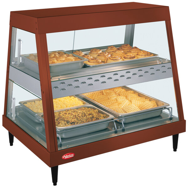 A Hatco countertop display case with food in it.