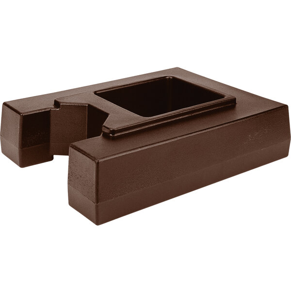 A dark brown rectangular riser with a square hole.