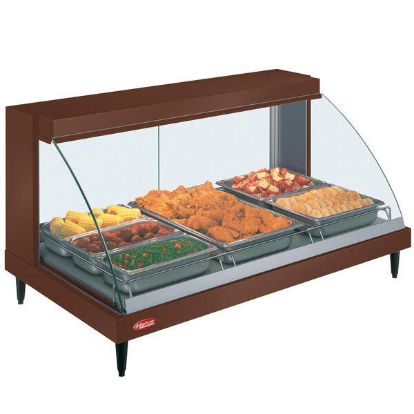 A Hatco copper countertop display case with food inside.