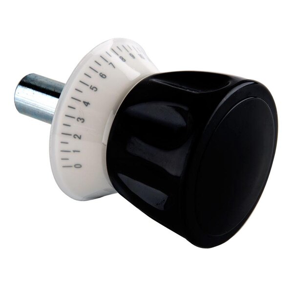 A black and white knob with a white circle on a metal cylinder.