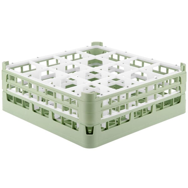 A light green Vollrath glass rack with 16 compartments.