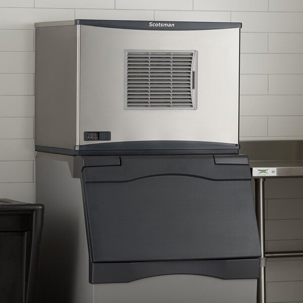 A Scotsman air cooled ice machine with a metal vent.
