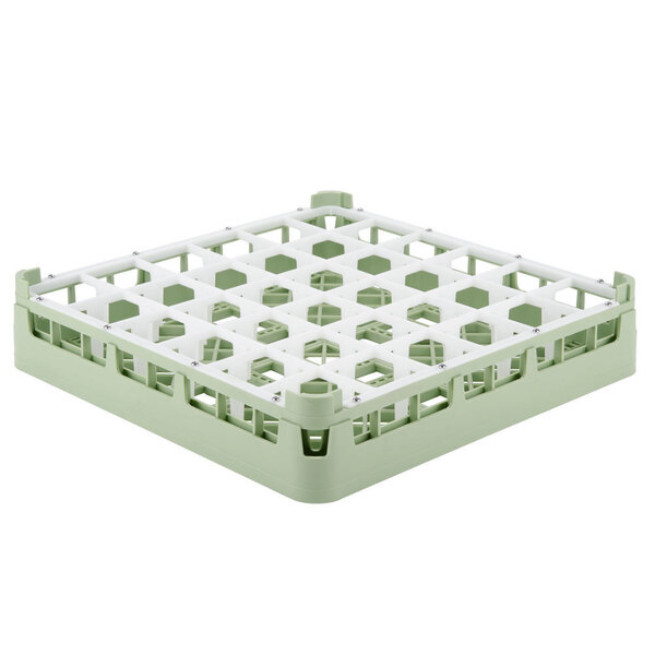 A white and green plastic Vollrath glass rack with 36 compartments.