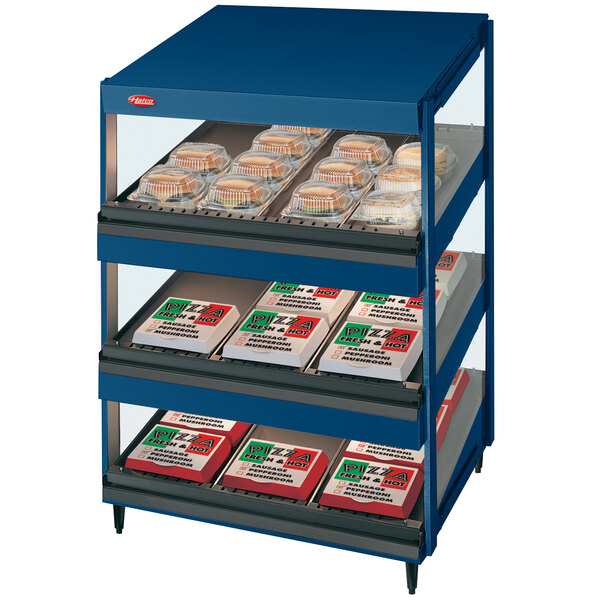 A navy blue Hatco countertop display case with three slanted shelves of food.