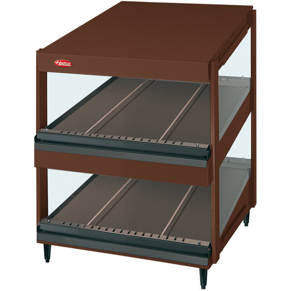 A brown metal display case with two slanted shelves inside.