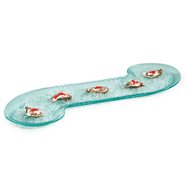 A GET Jade polycarbonate S-shaped platter with food on ice.