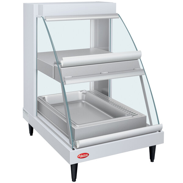A white Hatco countertop food warmer with glass doors.
