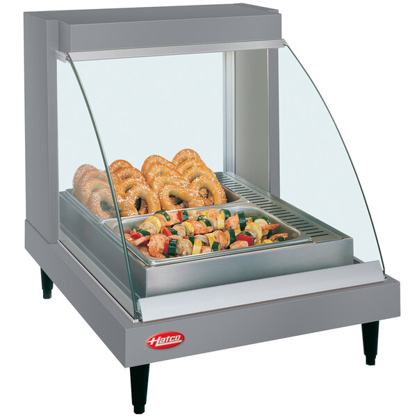 A Hatco Glo-Ray food display case with food inside.