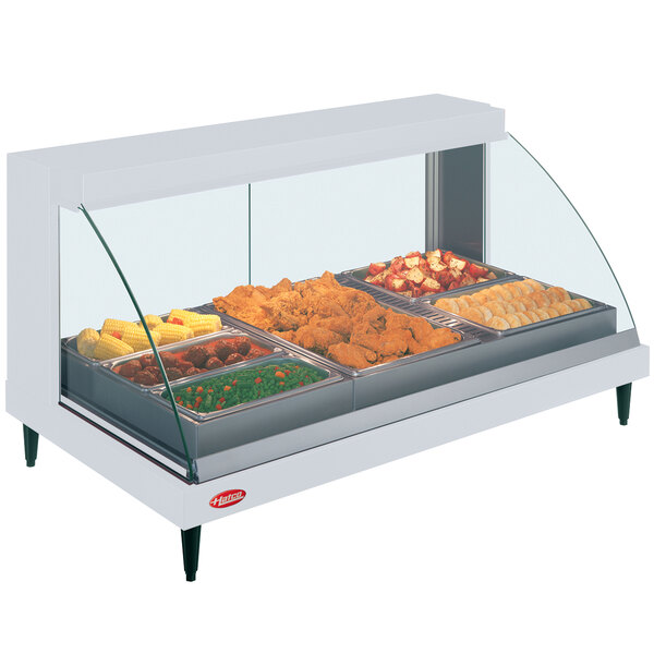 A white Hatco countertop display case with food in it.