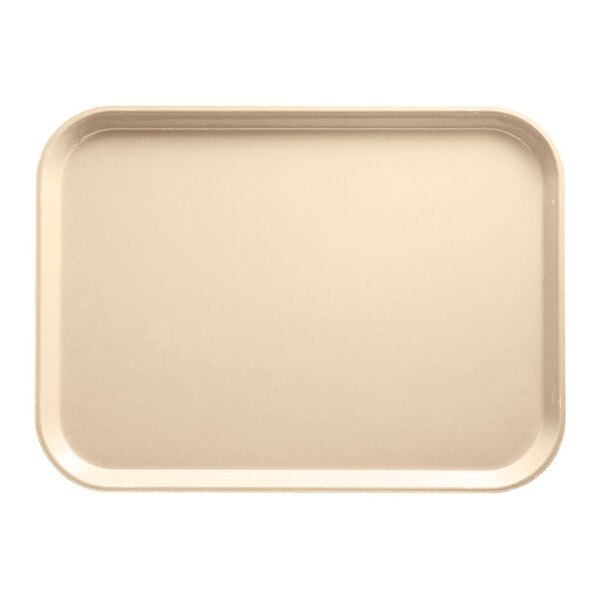 A rectangular beige Cambro serving tray with a white surface.