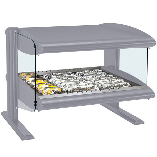 A gray granite Hatco countertop food warmer with LED lights on a table with food displayed on shelves.