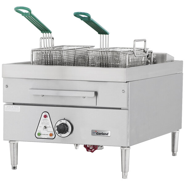 A large Garland commercial countertop deep fryer with green handles.