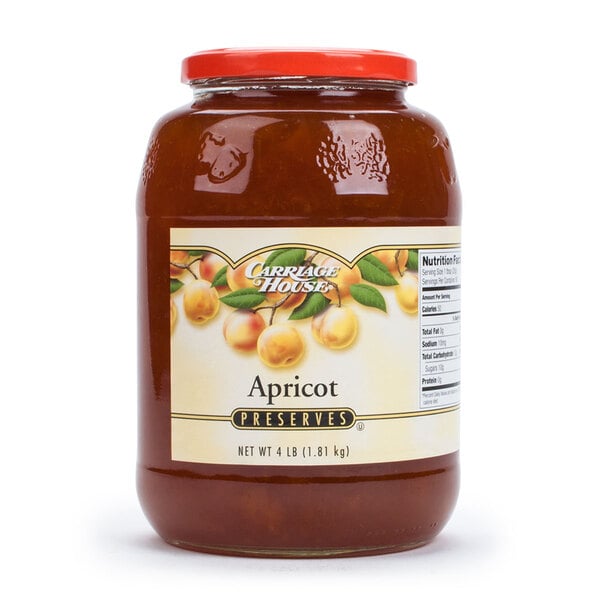A case of six open 4 lb. glass jars of apricot preserves.