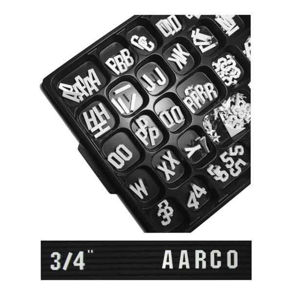 A black tray with white Aarco Gothic style letters and numbers.
