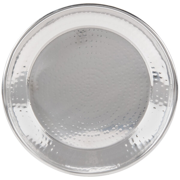 A round stainless steel plate with a hammered pattern.