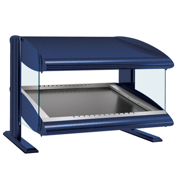 A blue and silver Hatco heated food warmer with a slanted glass shelf.
