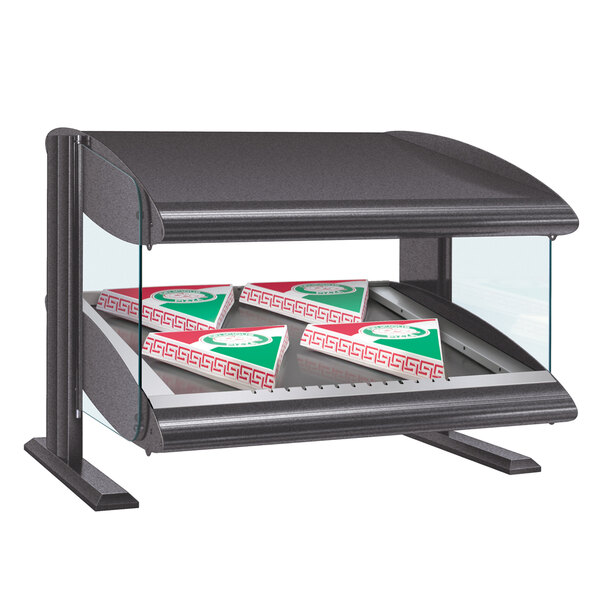A black Hatco countertop heated zone merchandiser with pizza boxes on a slanted shelf.