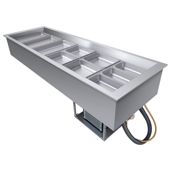 A Hatco drop-in cold food well with a black drain hose.