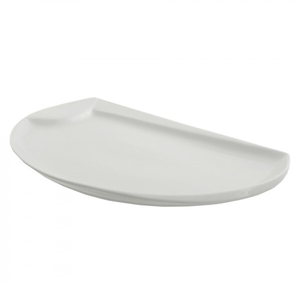 A white rectangular porcelain platter with curved edges.