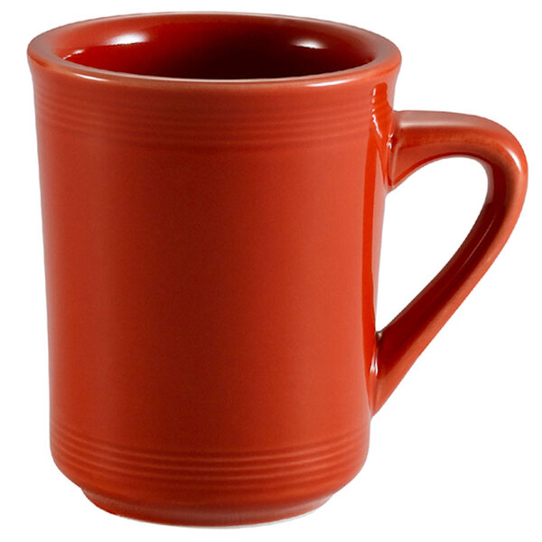 A close-up of a CAC red coffee mug with a handle.