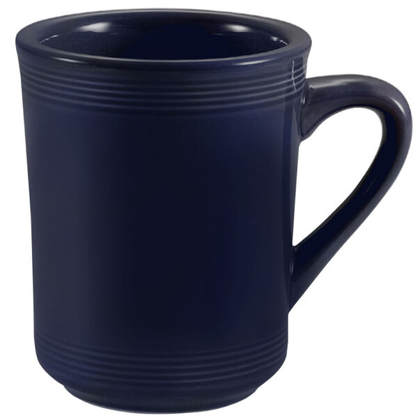A CAC cobalt blue coffee mug with a handle.