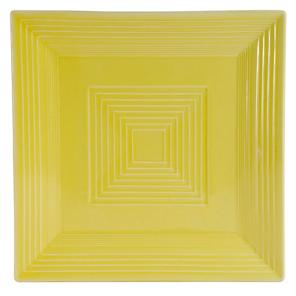 A yellow square plate with white lines.