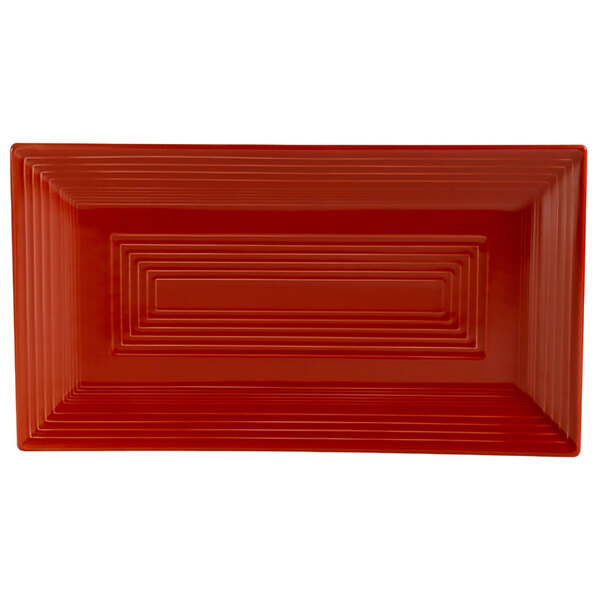 A red rectangular CAC China platter with lines.