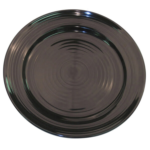 A close-up of a black CAC Tango round plate with a circular rim.