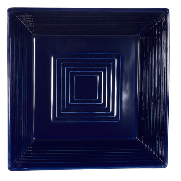 A blue square bowl with white lines.