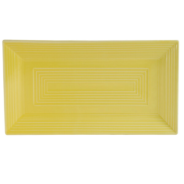 A yellow rectangular platter with white lines.