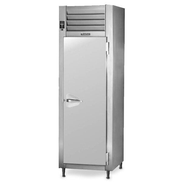 A Traulsen stainless steel reach-in refrigerator with a solid door open.