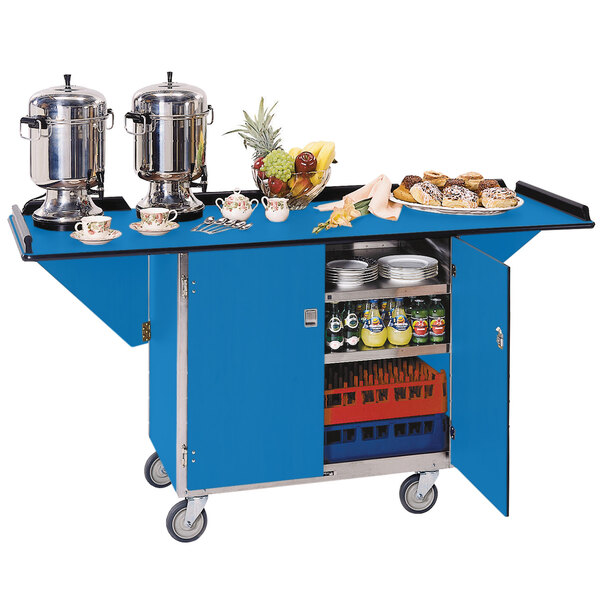 A Lakeside stainless steel drop-leaf beverage service cart with a royal blue finish holding food on it.