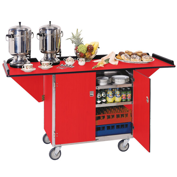 A red Lakeside serving cart with food and drinks on it.