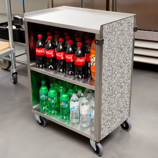 A Lakeside stainless steel utility cart with bottles of soda and a variety of beverages.